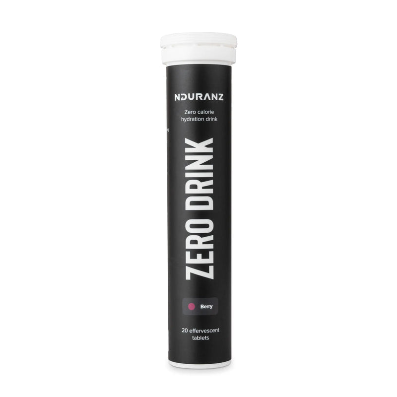 Nduranz Zero Drink - 20 comprimés effervescents saveur fruits des bois, tube cylindrique noir avec bouchon à vis blanc sur fond blanc.